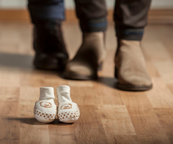 tiny shoes and parent shoes baby